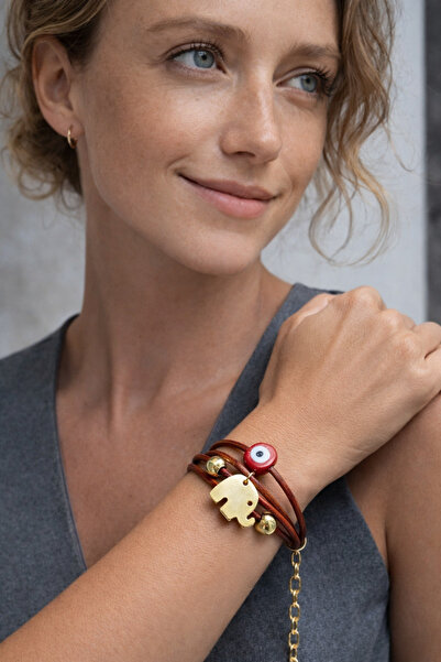 Kutcha Accessories سوار جلدي ذهبي اللون مزين بالخرز على شكل عين الشر