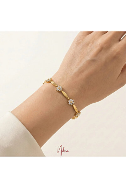 Nikra Saat Çiçek Motifli Taş Detaylı Altın Renk Bileklik – Zarif ve Şık Tasarım