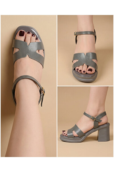 Nobrand Black snake-print sandal with a wide heel