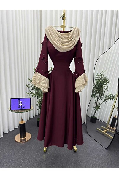 LAMSAT LATIN A royal burgundy dress that reflects luxury and femininity.