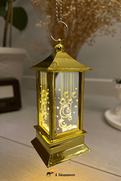co arma A decorative gold Ramadan lantern, 14 cm tall