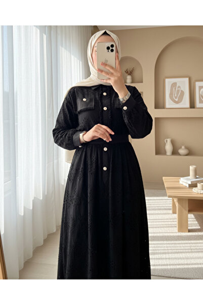 heree طقم علوي وسفلي أنيق وعصري للمحجبات مع تنورة مزينة بأزرار لؤلؤية وتفاصيل...