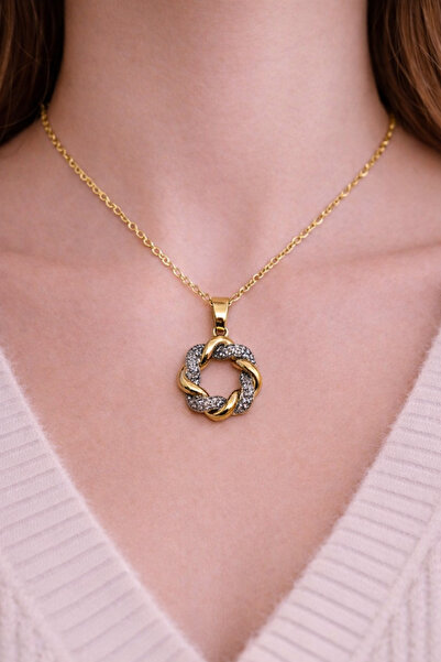 Tasarım قلادة نسائية على شكل حلقة ملتوية مرصعة بالذهب والفضة