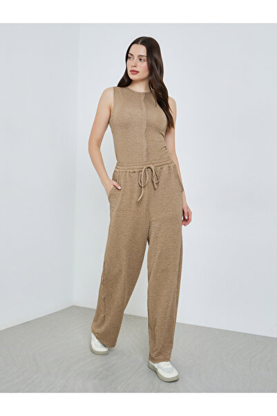 Styli Women Beige Textured Wide Leg Trousers