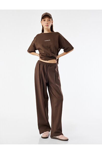 Koton Βαμβακερή άνετη φόρμα με πλισέ μέση με κορδόνια φαρδιά παντελόνια