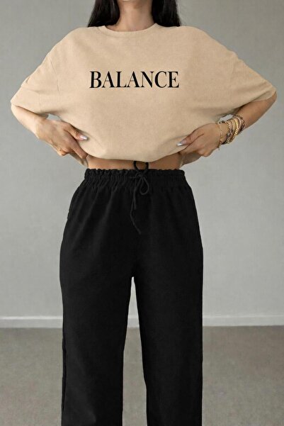 zeag طقم تي شيرت رياضي مطبوع عليه كلمة BALANCE للنساء