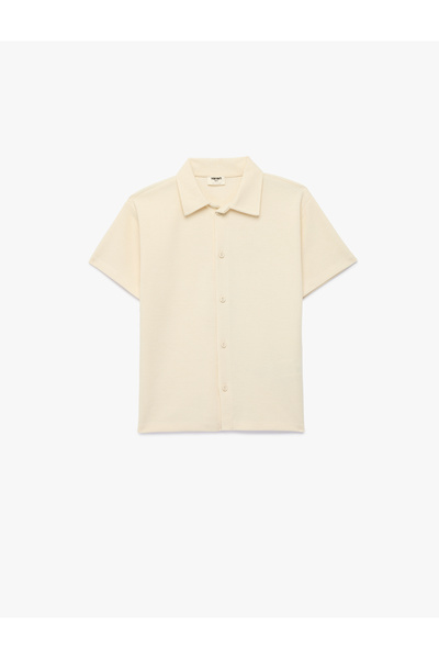Koton Κοντομάνικο μπλουζάκι με κουμπιά και γιακά πουκάμισου σε oversized γραμμή