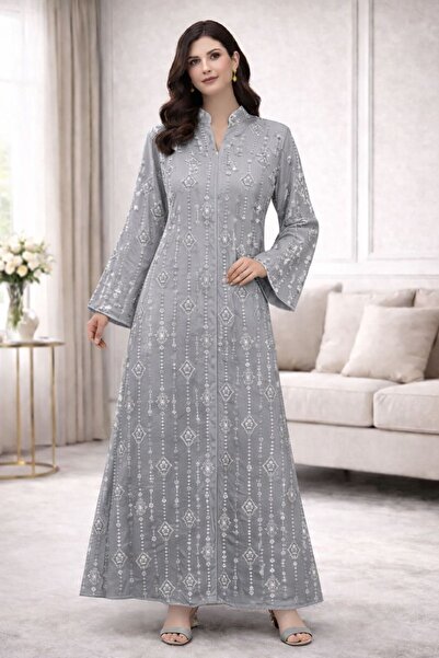 ELLA A Gulf-style jalabiya with a feminine design and luxurious embroidery th...