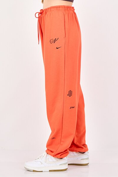 orange nike joggers womens
