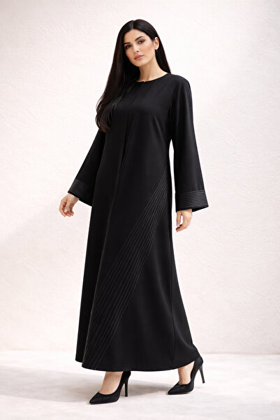 Elegant A black balloon abaya in crepe fabric, decorated with cord, comes wit...
