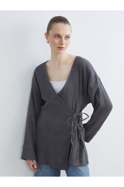 LC Waikiki Özmarka Noul sezon decolteu petrecut în V texturat Kimono de musel...