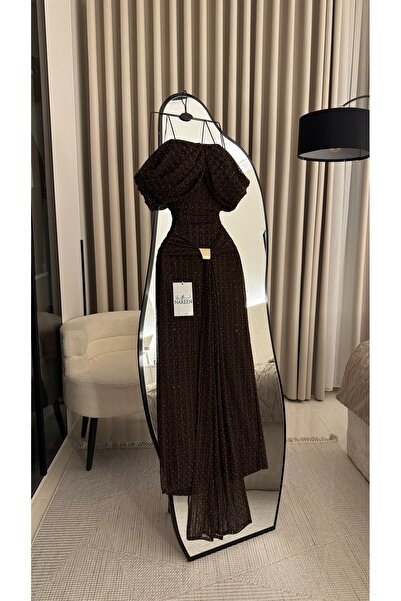 Nareen Fashion An elegant evening dress in a shimmering dark brown, combining...