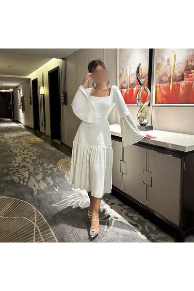 NASMA Eid dress in a soft and elegant Barbie-style fabric