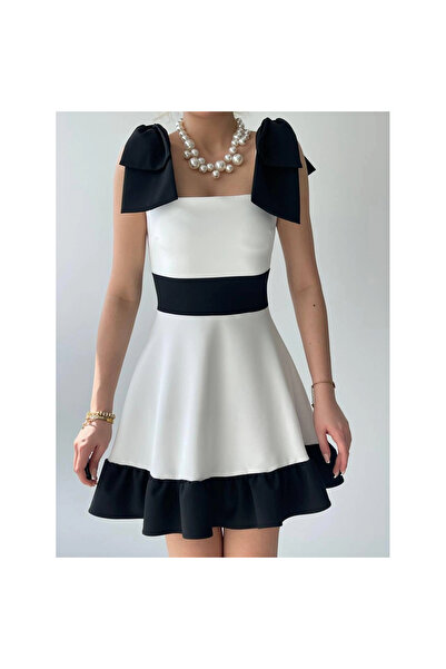 Bizcomoda    Miron Shoulder Bow Dress