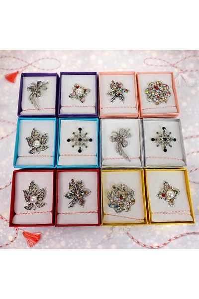 velve Set of 12 elegant martisor brooches with floral design, in individual b...
