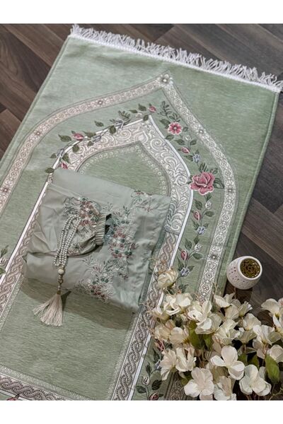 GENERAL A prayer set consisting of a Rug , a prayer mat, and a Quran case.