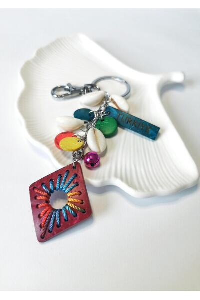 Halley Concept Red quadrilateral figure keychain charm with turkish writing