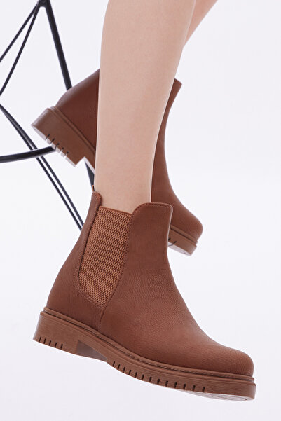 Tonny Black Жіночі шкіряні черевики з еластичною підошвою