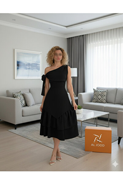 ALGOOD A soft, royal black dress with smooth layers in Barbie fabric.