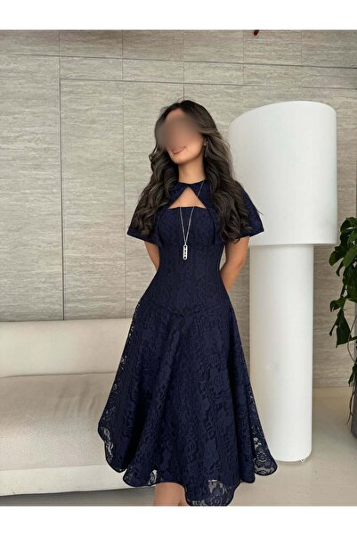 REVE A luxurious navy Lace dress, with an elegant classic cut and a distincti...