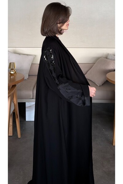 thaayira "Fionka" Royal Abaya - A blend of jacquard and web fabric with a hal...