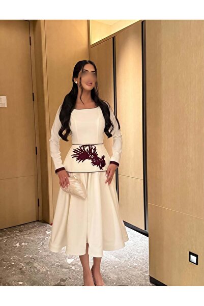 Model Leyna The white dress): A white midi dress with soft, regal touches