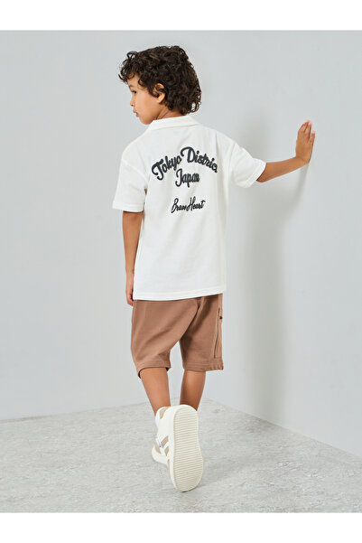 Styli تيشيرت رياضي للأولاد الصغار برسومات أمامية وخلفية مع شورت