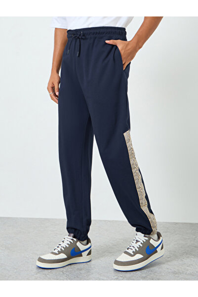 Styli Men Navy Blue Printed Oversized Joggers