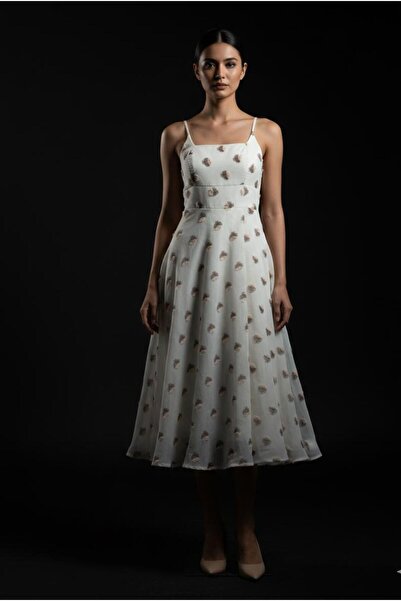 Saudia White midi dress with thin straps and prominent embroidery