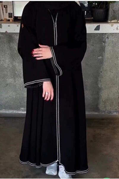 Lamsa Lina's black abaya with white thread – a wide Linen abaya with an elega...