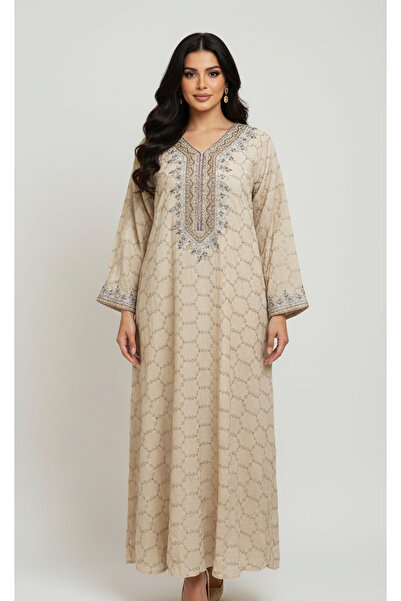 Moda Line A distinctive women's jalabiya with sequin embroidery.