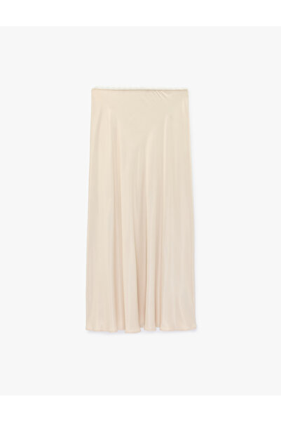 Koton تنورة نسائية متوسطة الطول من الساتان البيج