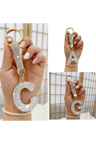 Ervalina Breloc cu literă din piatră albă