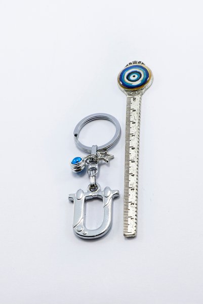 biuti Silver Colored Star Evil Eye Beaded Metal Letter U Keychain / Letter Bag Ornament