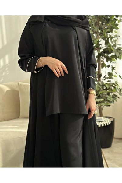 Abay-ti Women's abaya, a striking contrast of black and white... unmistakable...