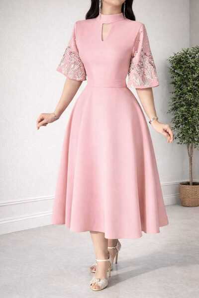 Jood Eid dress with wide sleeves and elegant hand embroidery