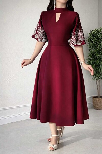 Jood Eid dress with wide sleeves and elegant hand embroidery