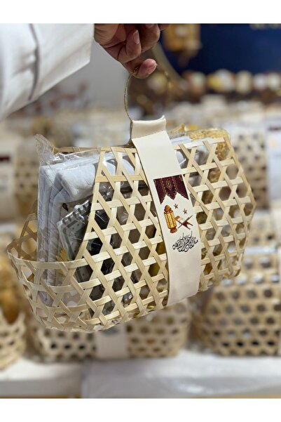 Makeup A complete Quran, a standard-size prayer rug, an electronic prayer bea...