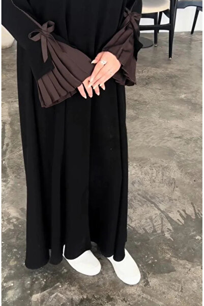 Abay-ti أناقة اللون الأسود الكلاسيكي تلتقي بدفء البني في كسرات راقية على الأك...