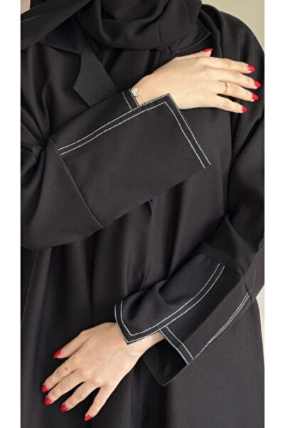 Abay-ti A black blazer abaya with delicate embroidery on the sleeves… an eleg...
