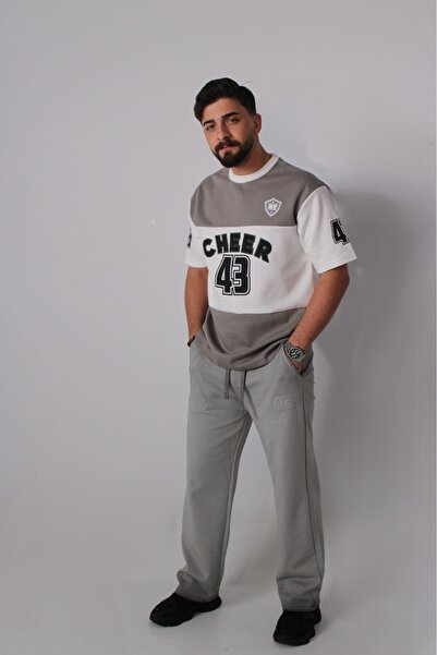 ALANAQA Oversized Orthopedic t-shirt in multiple colors for both genders.