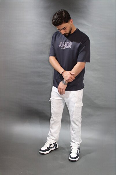 ALANAQA Oversized Orthopedic t-shirt in multiple colors for both genders.