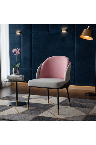 GLAMOURE HOME This living room chair is upholstered in floral and gray fabric...