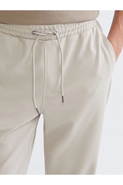 LC Waikiki Ανδρικό παντελόνι φούτερ σε μπεζ Standard Fit