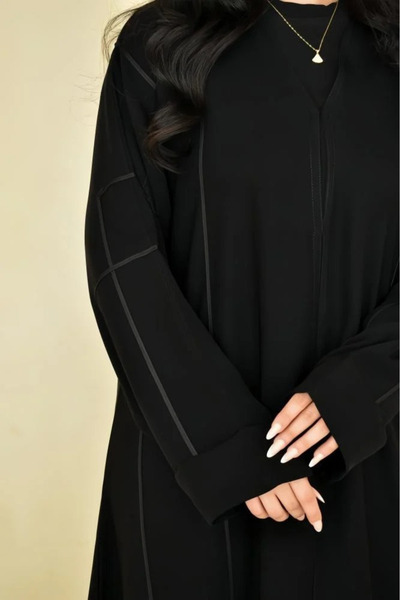 Abay-ti Women's black abaya with front and sleeve trim, fastened with a conce...