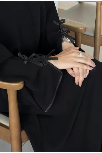 Abay-ti Black abaya with two bows on the sleeves… Elegant femininity with cha...