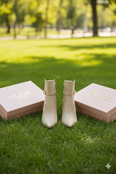 NUDE kadın sıvrı tokalı krem renk bot