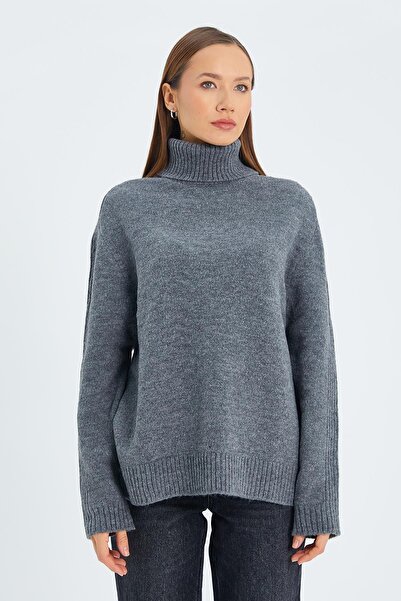 Hiccup Mixray knitted sweater with high collar and loose fit