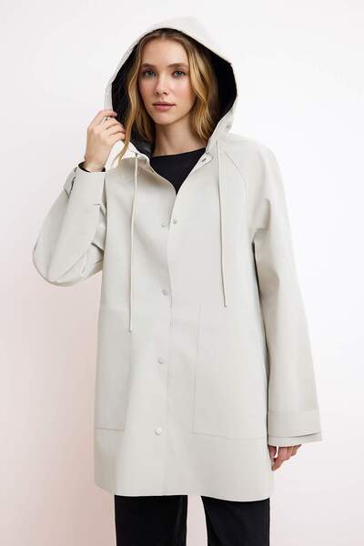 Trendyol Collection Ecru Oversize Water Repellent Langer Regenmantel mit Kapu...