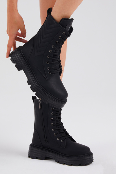 Tonny Black Bequeme Schnürstiefel für Damen mit schwarzem Hautmuster